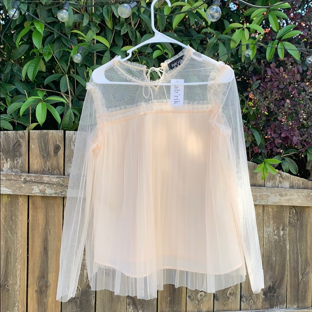 Mock neck sheer sleeve top. Fab’ rik